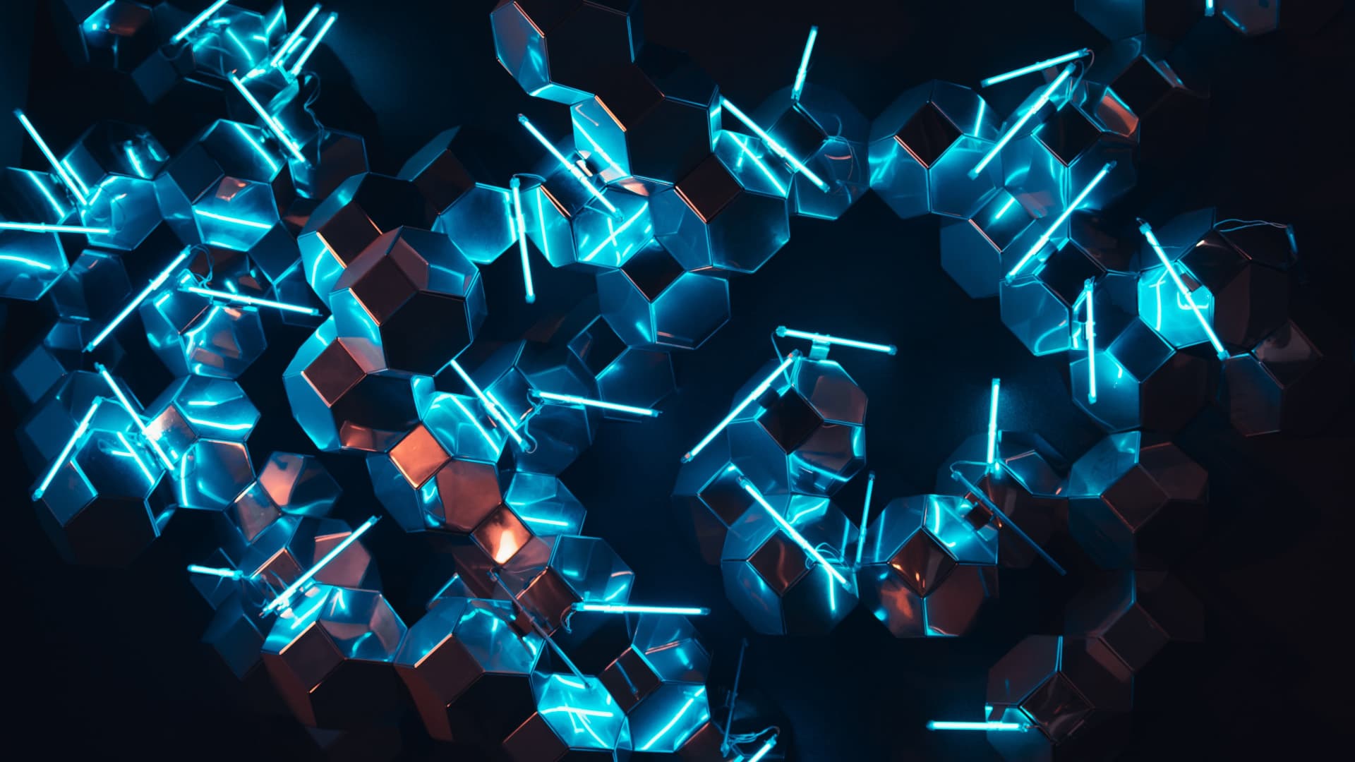 Abstract photography of cubes and lights scattered alongside eachother in a dark environment, giving off a technical and complex vibe